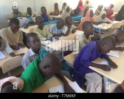 Children rescued from Boko Haram town attending school in IDP Center in Maiduguri Stock Photo