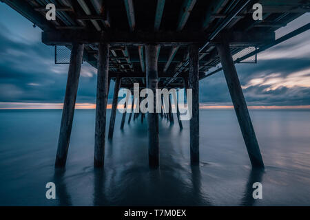 Long exposure after sunset under the pier in Imperial Beach, near San Diego, California Stock Photo