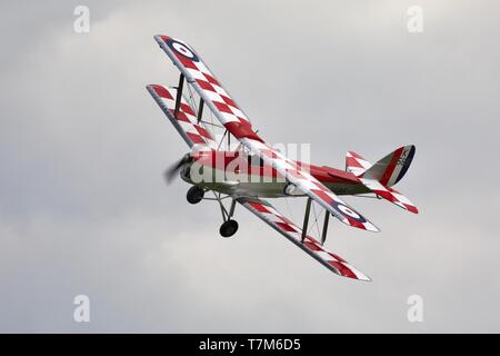 1931 DH82a Tiger Moth airborne at the Shuttleworth season premiere airshow on the 5th May 2019 Stock Photo