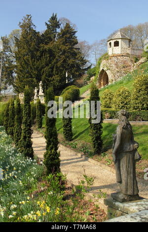 Belvour Castle gardens.  A summer house presides over a formaa  avenue leading to a statue garden at this Leicestershire stately home, UK