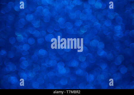 Dark blue bokeh defocused background Stock Photo