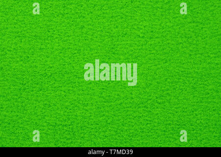 Green spotted surface close up. Texture and background Stock Photo