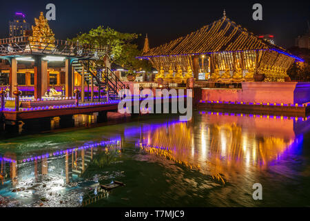 The Seema Malakaya Buddhist Temple sits on an island in Beira Lake at the heart of Colombo, Sri Lanka.  Designed by Geoffrey Bawa, the temple and medi Stock Photo