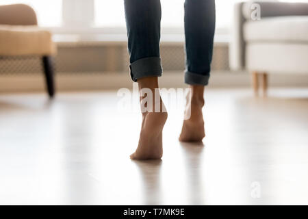 Rear view woman feet heel close up stands on tiptoes Stock Photo