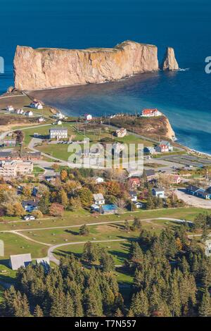 Canada, Quebec, Gaspe Peninsula, Perce, elevated view of town and Perce Rock from Mont Ste-Anne, autumn Stock Photo