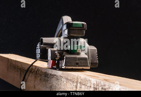 Wood sanding machines belt sander in workshop Stock Photo