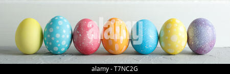 Decorated Easter eggs on color background, closeup. Space for text Stock Photo