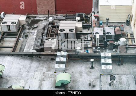 New York City, USA aerial view of urban rooftop building in NYC Herald Square Midtown with air conditioner units