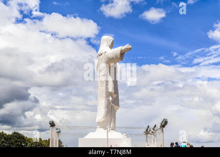 Statue of Cristo Blanco, White Christ. It is located on top of Red Hill, Pukamuqu, at 3600m height and it is natural viewpoint of the Cusco city in Pe Stock Photo