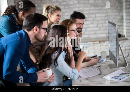 Young architects working on project in office Stock Photo