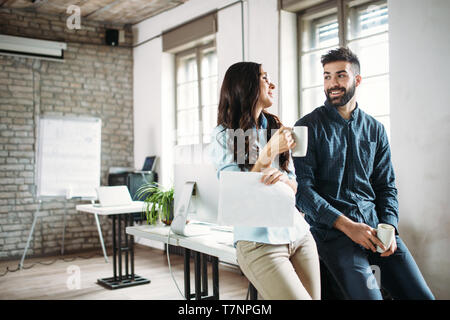 Portrait of architects having discussion in office Stock Photo