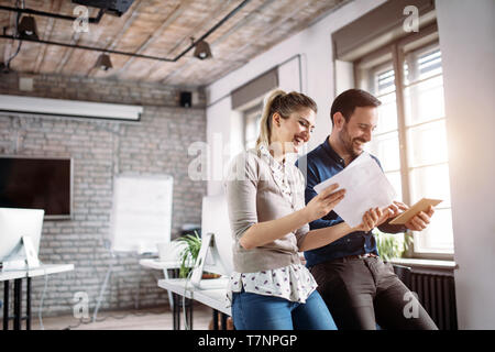 Portrait of architects having discussion in office Stock Photo