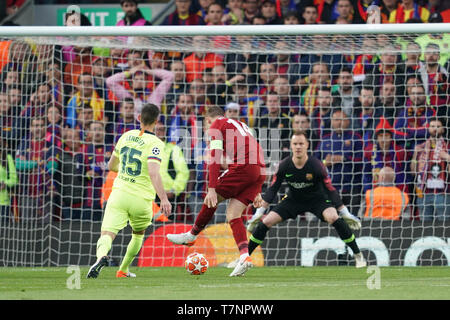 Liverpool's Jordan Henderson (C) shoots at goal  7th Mayl 2019 , Anfield Stadium, Liverpool, England;  UEFA Champions League Semi Final, Second Leg, Liverpool FC vs FC Barcelona   Credit: Terry Donnelly/News Images Stock Photo