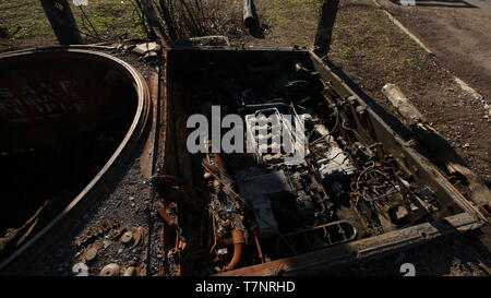 Blasted tank in the war. Caterpillar. Trunk. Stock Photo