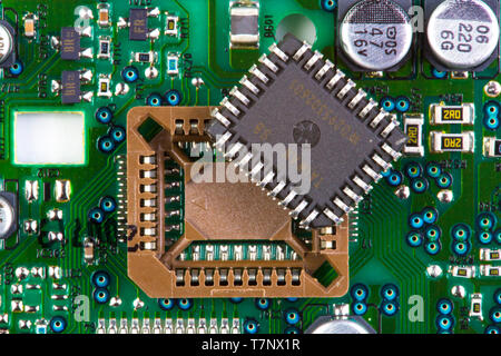 Microprocessor socket on green printed circuit board Stock Photo