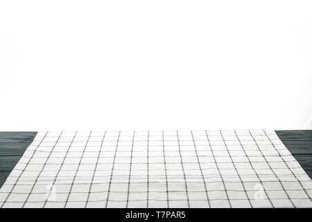 Fabric napkin on table against white background, space for text Stock Photo