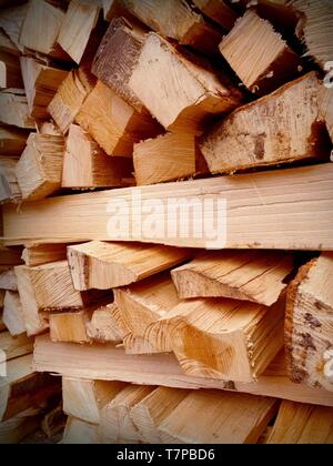 our pile of firewood is waiting to burn Stock Photo