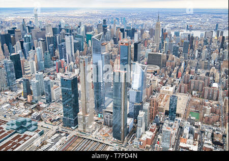 New York City from helicopter point of view. Midtown Manhattan and Hudson Yards on a cloudy day, USA