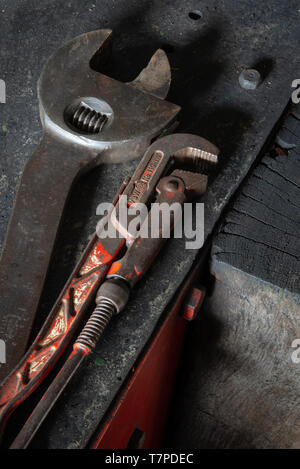 Metal wrenches on a bench in a train engineers workshop, the Mining Museum, Lake District, UK Stock Photo