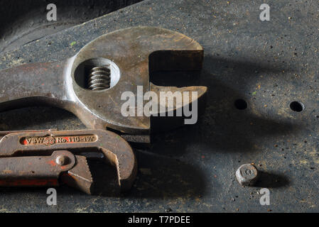 Metal wrenches on a bench in a train engineers workshop, the Mining Museum, Lake District, UK Stock Photo
