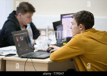 Belarus, Gimel, March 2, 2019. Business Center. Hackathon city. Young programmers at the computer. Stock Photo