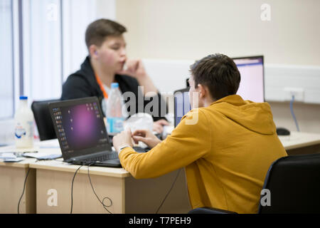 Belarus, Gimel, March 2, 2019. Business Center. Hackathon city. Young programmers at the computer. Stock Photo