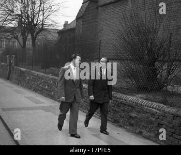 The Wedding of Mr & Mrs Lloyd, 202A Cassland Road, London, E8 c1965. The Groom and Best Man walking to the church. Photo by Tony Henshaw Stock Photo