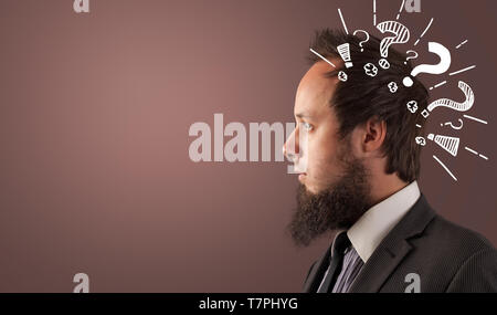 Head with white question marks, and copy space  Stock Photo