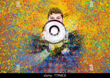 man shouting in megaphone, creative colorful splashes on the image, concept of extraordinary advertising Stock Photo