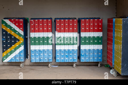 South Africa: The Himeville mini mall with mailboxes painted in the colours of the South African flag. Stock Photo