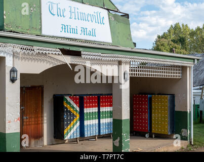 South Africa: The Himeville mini mall with mailboxes painted in the colours of the South African flag. Stock Photo