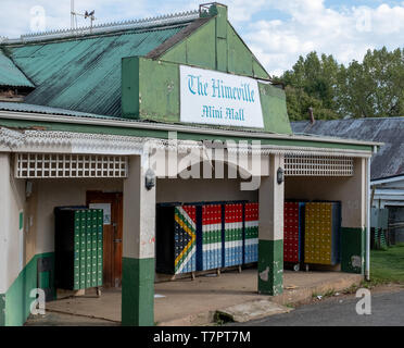 South Africa: The Himeville mini mall with mailboxes painted in the colours of the South African flag. Stock Photo