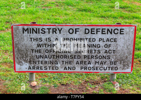 UK Official Secrets Act warning sign on the perimeter fence of a ...