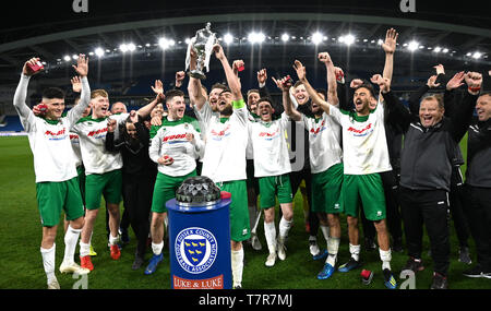 Bognor lift the trophy after winning the Sussex Senior Challenge Cup Final between Bognor Regis Town and Burgess Hill Town at the Amex Stadium. Credit : Simon Dack Stock Photo