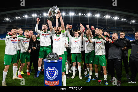 Bognor lift the trophy after winning the Sussex Senior Challenge Cup Final between Bognor Regis Town and Burgess Hill Town at the Amex Stadium. Credit : Simon Dack Stock Photo