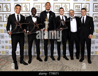 Liverpool's Andrew Robertson (centre) poses with his PFA Team of the ...