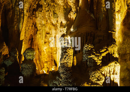 Cave with stalagmites and stalactites below the surface Stock Photo