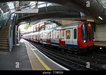 View of London underground train arriving at station - image Stock Photo