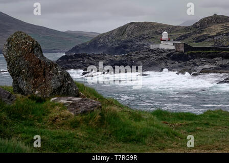 Cromwell Point Lighthouse.The lighthouse at Cromwell Point on Valentia Island, ensures boats arrive safely in Valentia harbor. Stock Photo