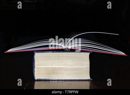 Open book on the table close-up Stock Photo
