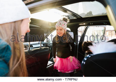 Cute toddler girl in car smiling at mother Cute toddler girl in car smiling at mother