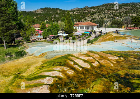 Karahayit town with red springs, near Pamukkale, tourist destination , Turkey, Red pools of Karahayit with the healthy mineral water in city of Denizl Stock Photo