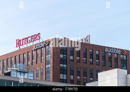 Newark, USA - April 6, 2018: Downtown city in New Jersey with office building Rutgers University and audible Amazon Stock Photo