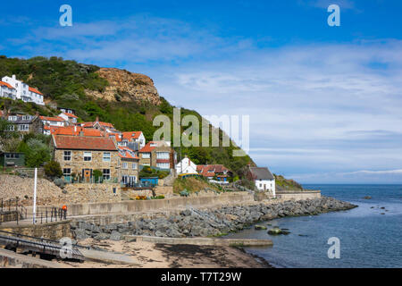 The small village of Runswick Bay with quaint houses and cottages mainly for holiday lets or second homes in North Yorkshire England Stock Photo