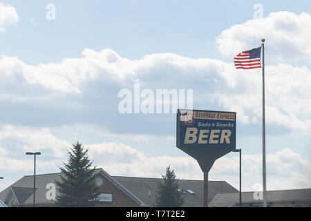 Carroll Township, USA - April 8, 2018: Beverage Express store on Interstate highway 15 selling soda, snacks and beer in Pennsylvania with American fla Stock Photo