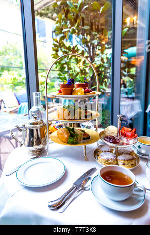 Afternoon tea at Ivy in the Park in Canary Wharf, London, UK Stock Photo
