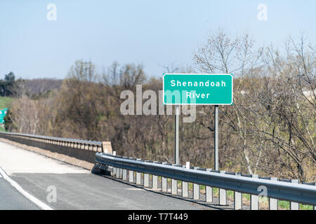 Green road sign for Shenandoah river in vally near Happy Creek in Virginia in summer or spring with trees Stock Photo