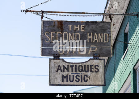 Lexington, USA - April 18, 2018: Historic downtown town city in Virginia countryside Shenandoah mountain village, vintage hanging signs for Goodhards  Stock Photo