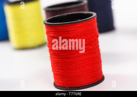 Spools of colorful thread using for needlework, embroidery and sewing Stock Photo