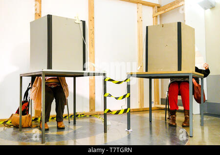 Hanover, Germany. 09th May, 2019. Two women are sitting in an electoral booth in the New Town Hall for the absentee ballot for the European elections on 26 May 2019. Credit: Christophe Gateau/dpa/Alamy Live News Stock Photo